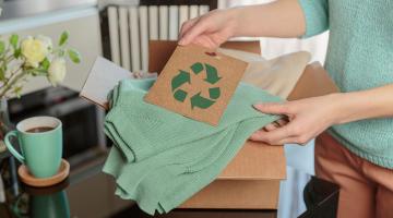 Clothing and recycle sign