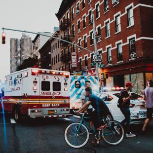 Ambulance and police car at an emergency scene