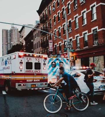 Ambulance and police car at an emergency scene