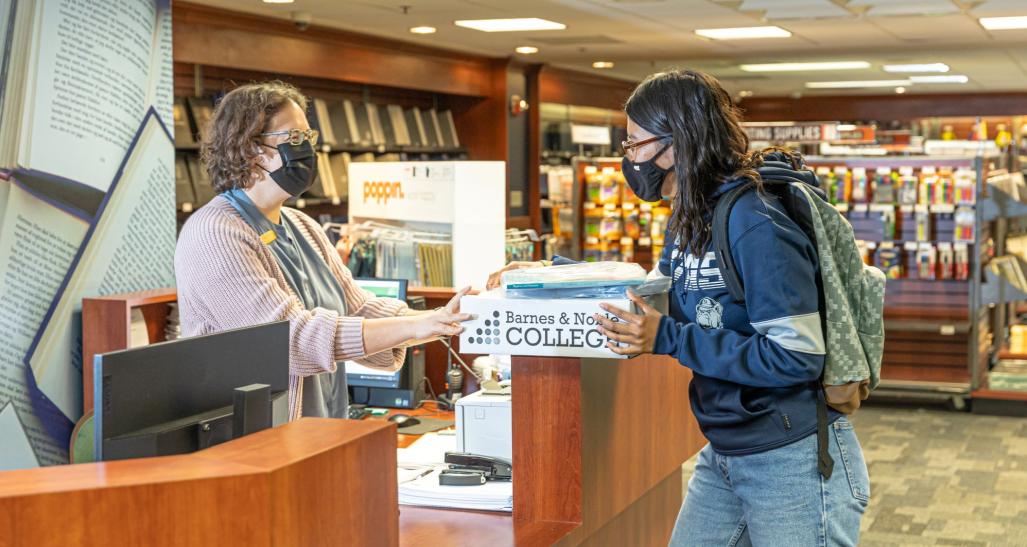 Two women having a conversation at Barnes and Noble College Store
