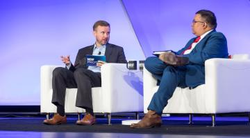 Christian Beckner and Nitin Natarajan speaking at NRF PROTECT.