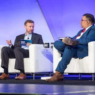 Christian Beckner and Nitin Natarajan speaking at NRF PROTECT.