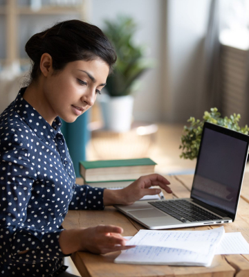 Woman working on computer.