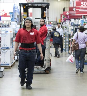 Employees working in warehouse store