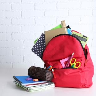 A backpack and school supplies.