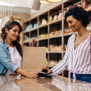Shopper paying with a credit card.