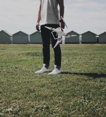man holding a drone