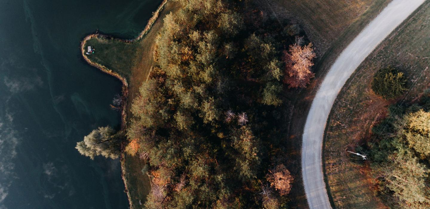 An aerial view of a long winding road in Iowa.
