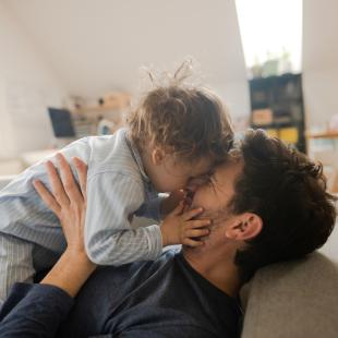 Father and baby at home