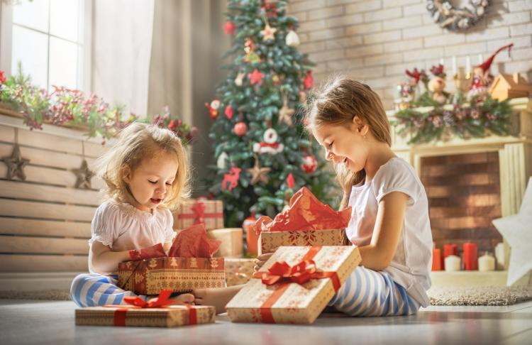 Girls opening gifts