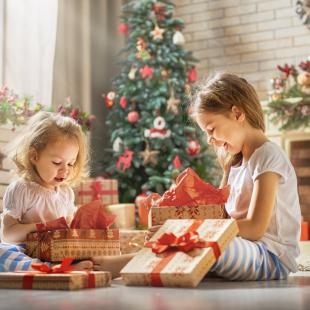 Girls opening gifts