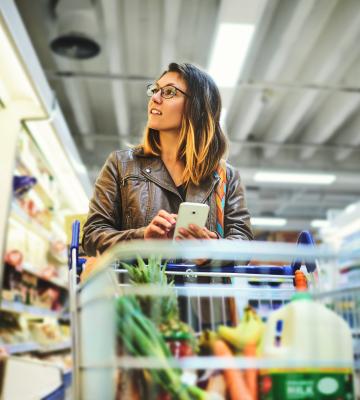 A woman shops in grocery store
