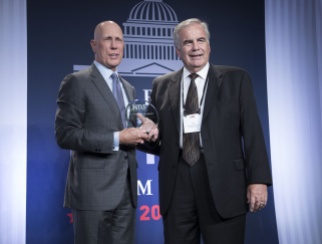 Matthew Shay, left, presents Jim Otto with NRF’s J. Thomas Weyant Award.