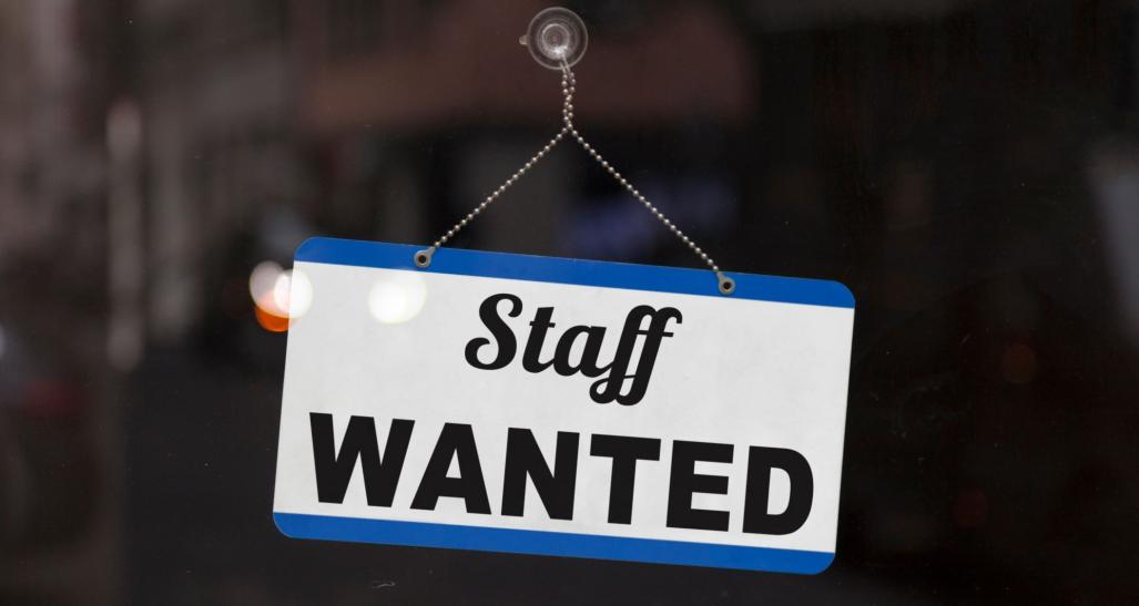 Staff wanted sign on door.