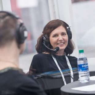 Laura Joukovski, TechStyle, records a podcast