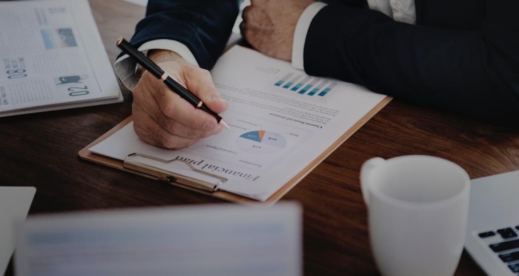 Image of business person examining data 