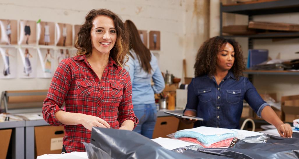 Retail workers packaging orders