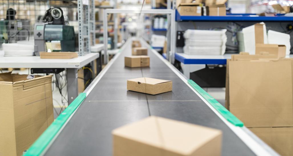 boxes are shown on a conveyor belt