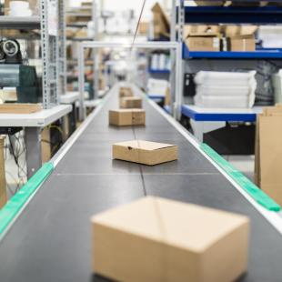 boxes are shown on a conveyor belt