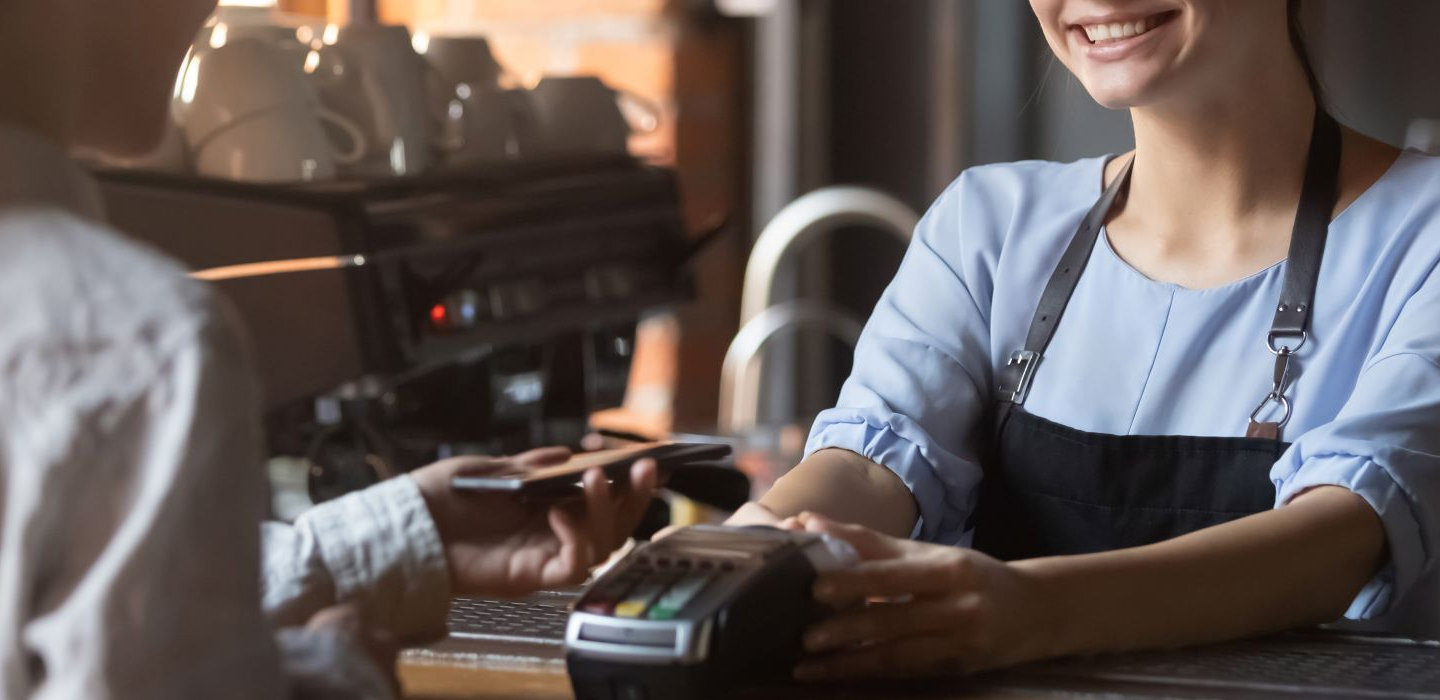 Customer paying for goods with a credit card. 