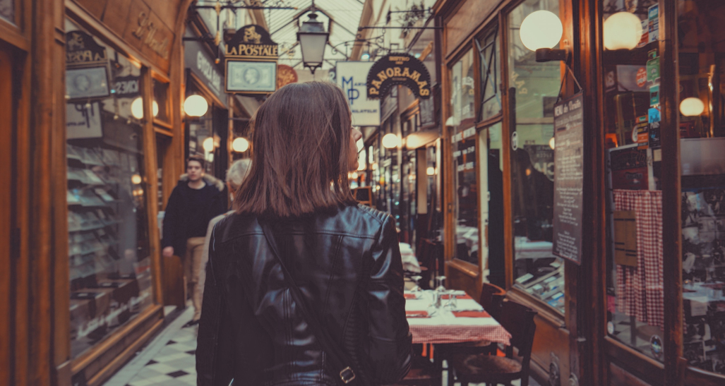 Unsplash woman walking through shopping experience