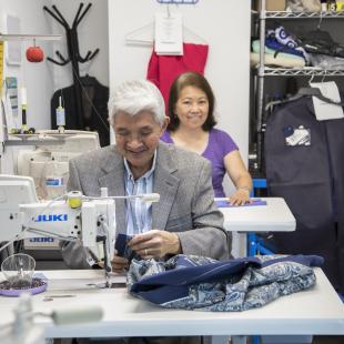 Trunk Club tailors working on sewing projects