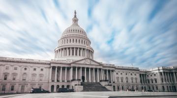 day time view of the capitol building in Washington, dc