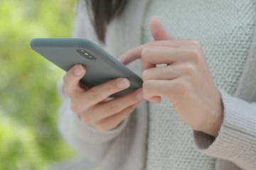 close up of woman's hands on a smartphone