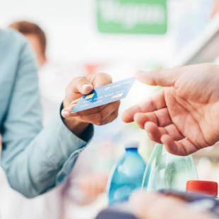 Woman pays with credit card