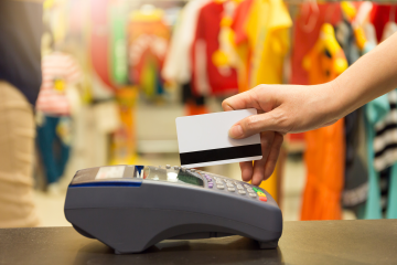 credit card swipe at a retailer